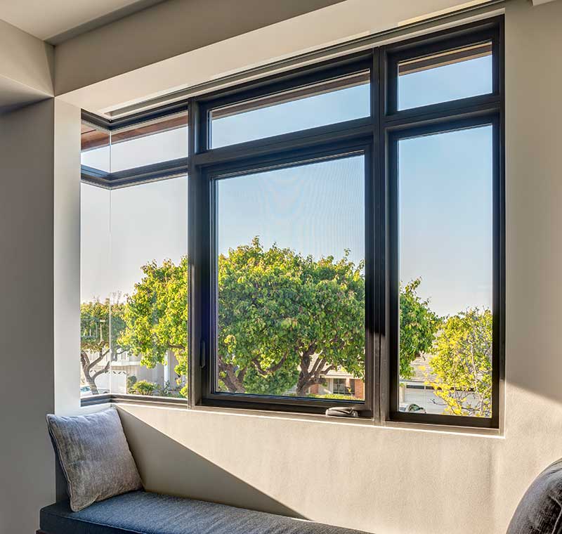 aluminum framed window over couch