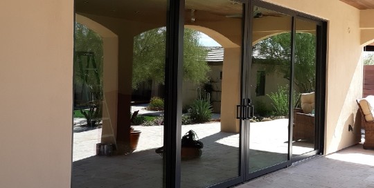 Arizona Window and Door in Scottsdale and Tucson showing black sliding french door on patio