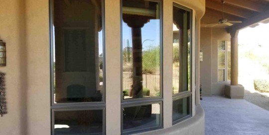 Arizona Window and Door in Scottsdale and Tucson showing wood windows on curve of house