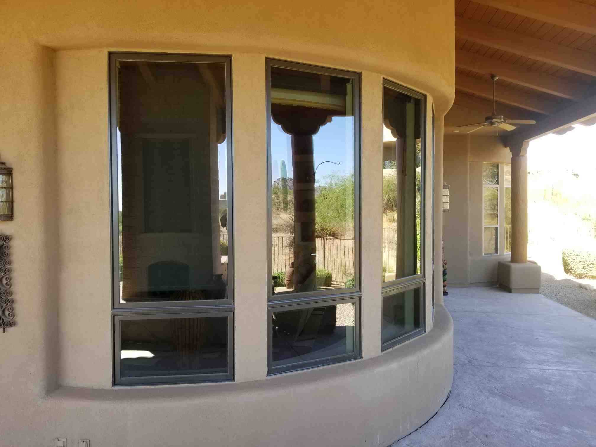 Arizona Window and Door in Scottsdale and Tucson showing wood windows on curve of house