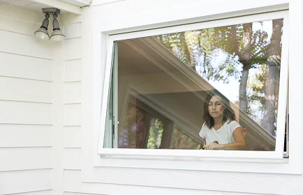 Homeowner selecting the right window options with consultant
